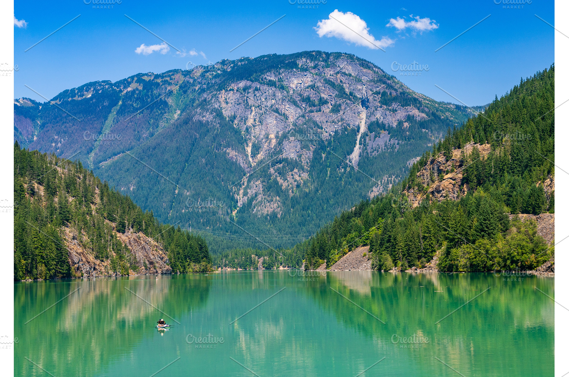 Paddleboard on Diablo Lake in North, a Nature Photo by Backyard Stock