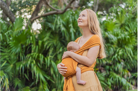 Mother holding her little baby in a