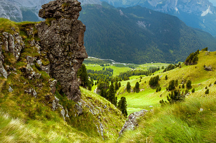 landscape with mountains, hills, clouds, grass and rocks, a Nature Photo by Alliance Images