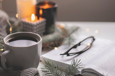 Banner image. Cozy home still life concept. Cup of hot coffee and opened book w, a Holiday Photo by Anikona