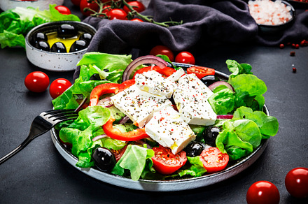 Greek salad with feta cheese, olives, cherry tomato, paprika, cu, a Food & Drink Photo by 5PH