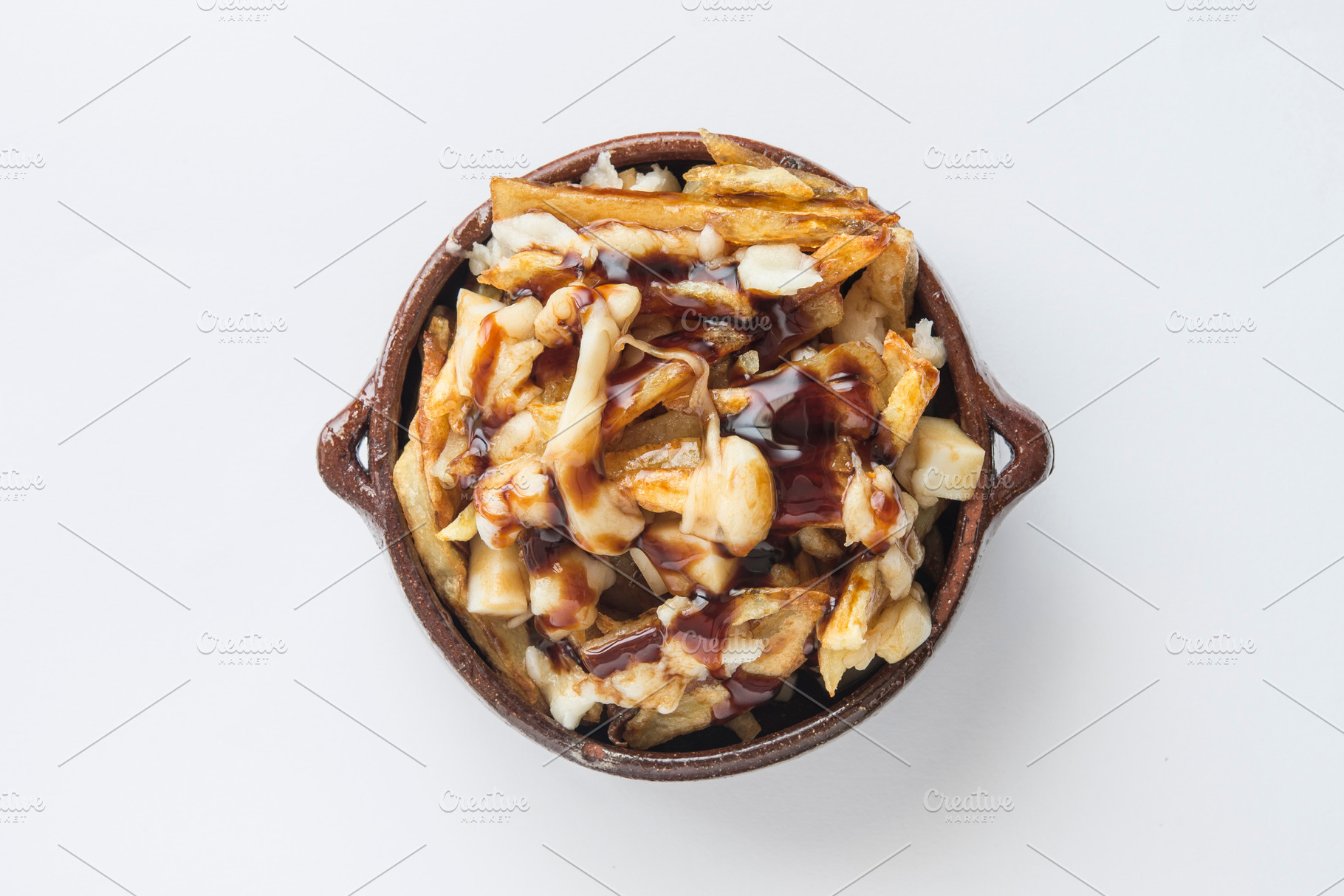 Poutine typical street food  in cana containing background, bar, and bastille, a Food & Drink Photo by DalaiFood