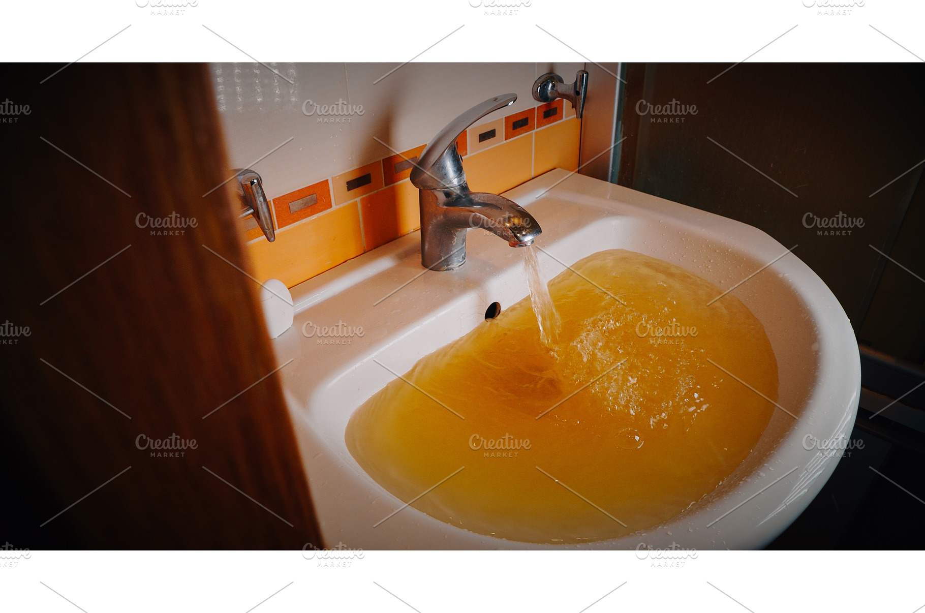Basin with yellow water creating, a Nature Photo by Our Amazing World
