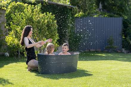 Mother having fun with children in a