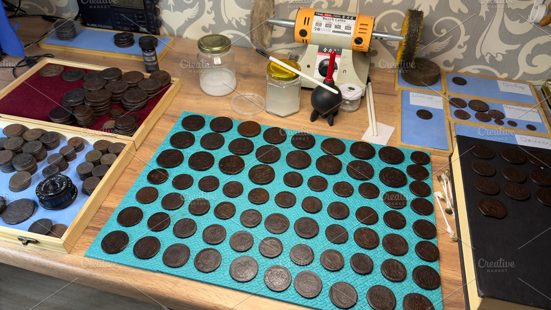 A collection of Russian Empire 5 kopecks of Catherine II coins displayed on a t, an Industrial Photo by Textures & Backgrounds