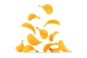 Grooved potato chips falling down.