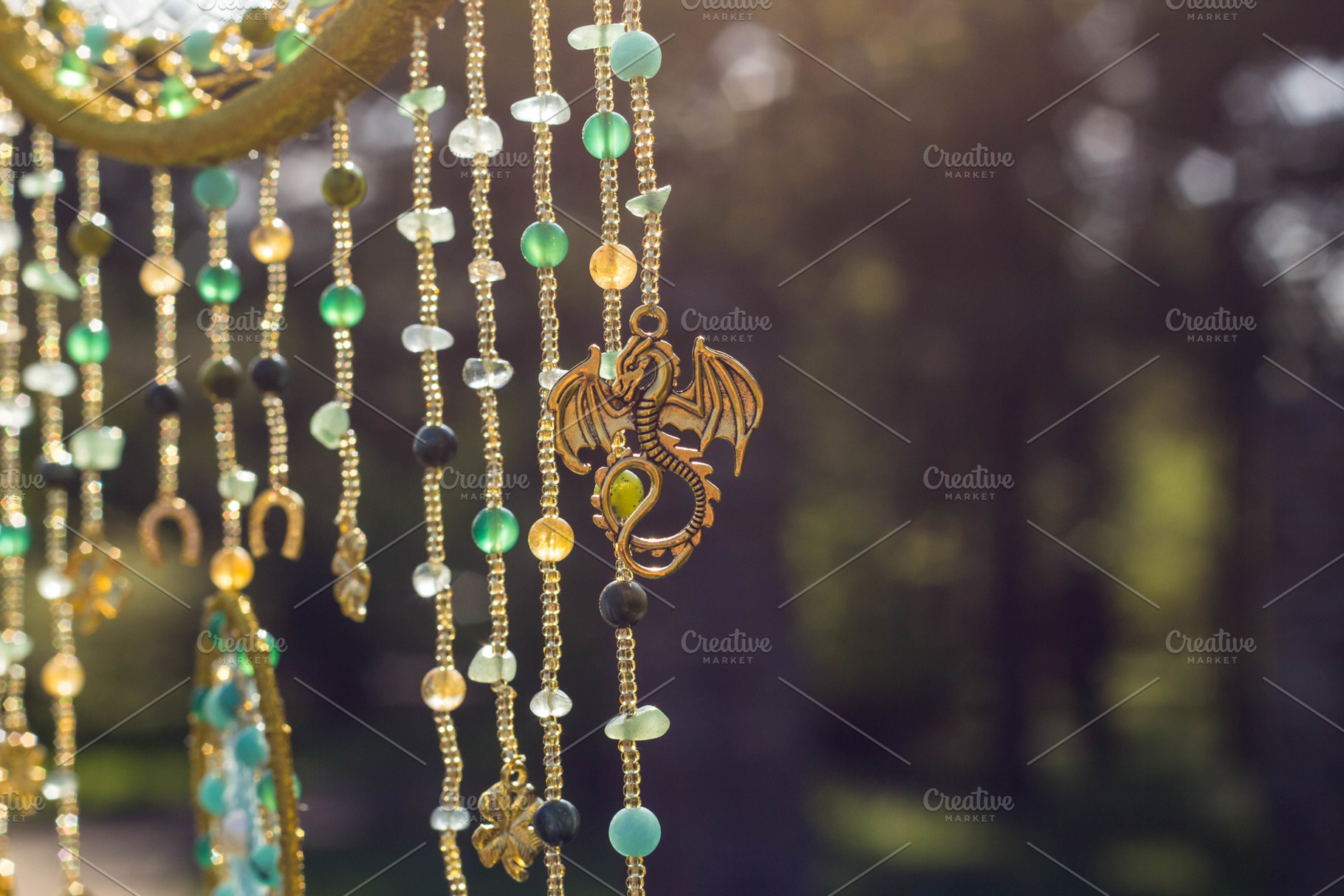 Handmade dream catcher with feathers featuring amulet, art, and background, an Arts & Entertainment Photo by dashtik