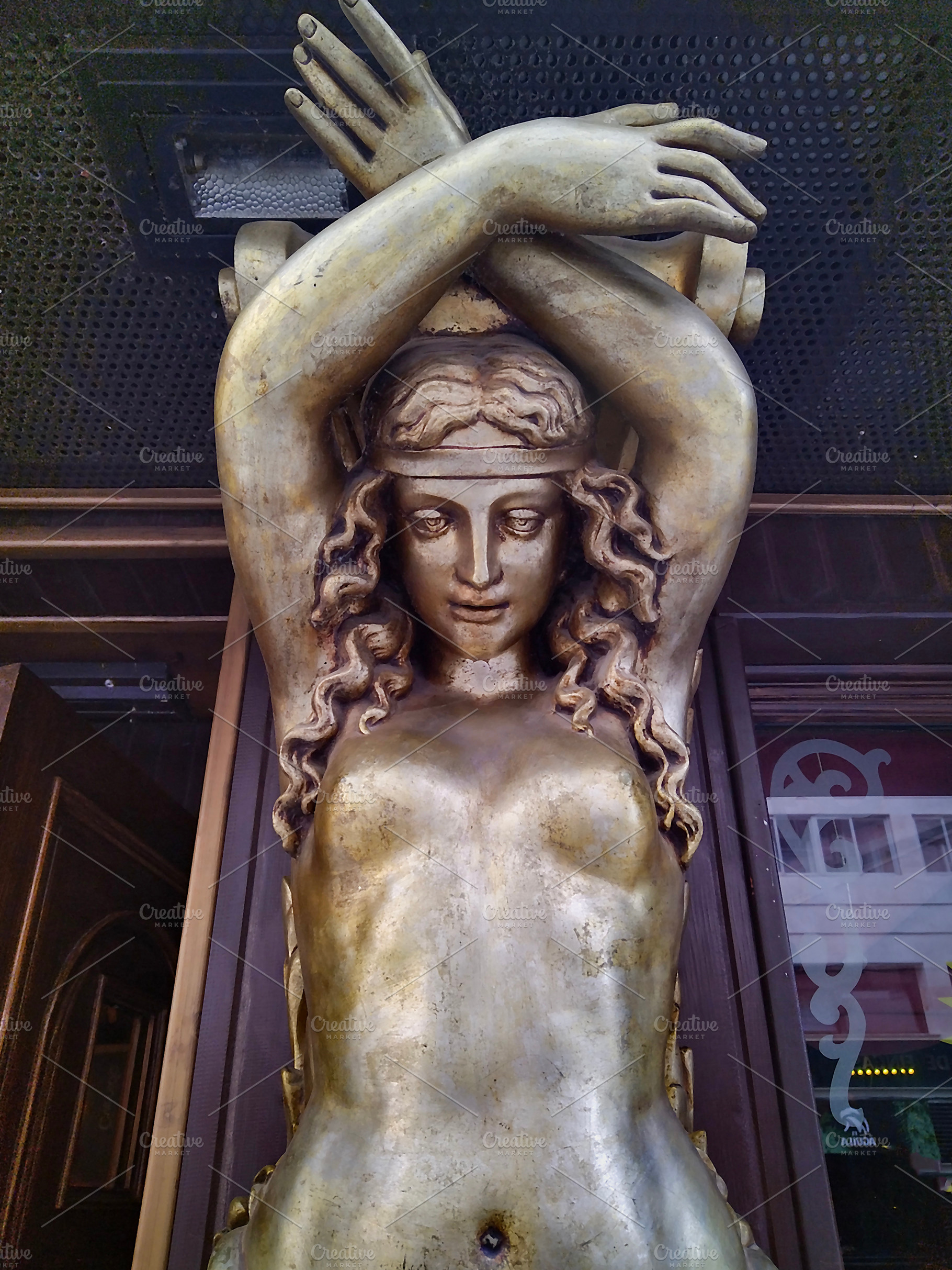 Mythologic golden statue of woman sculpture, an Arts & Entertainment Photo by DanFLCreativo