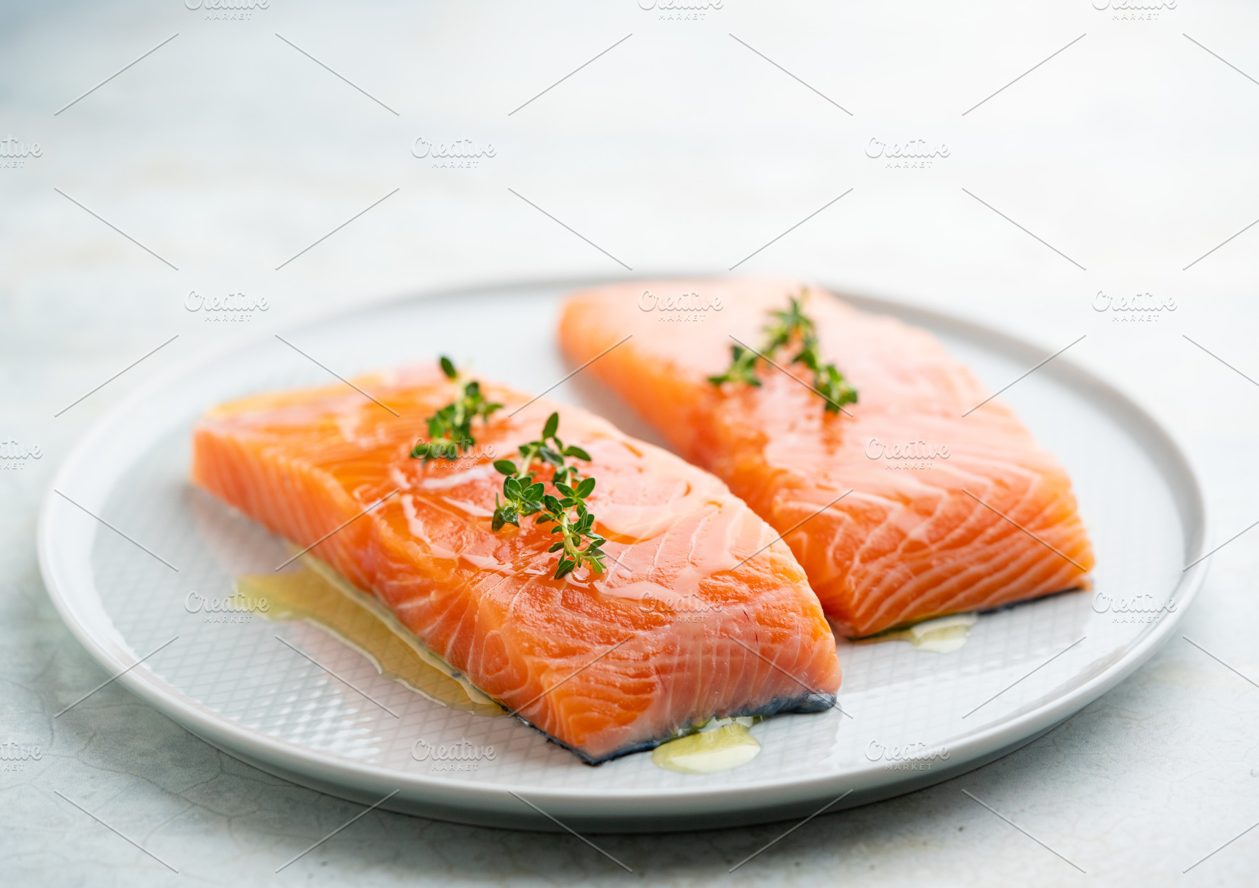 Fresh salmon fillet on a plate for delicious salmon steak., a Food & Drink Photo by FoodStock