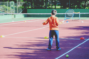 Young boy playing tennis stock photo containing tennis and game