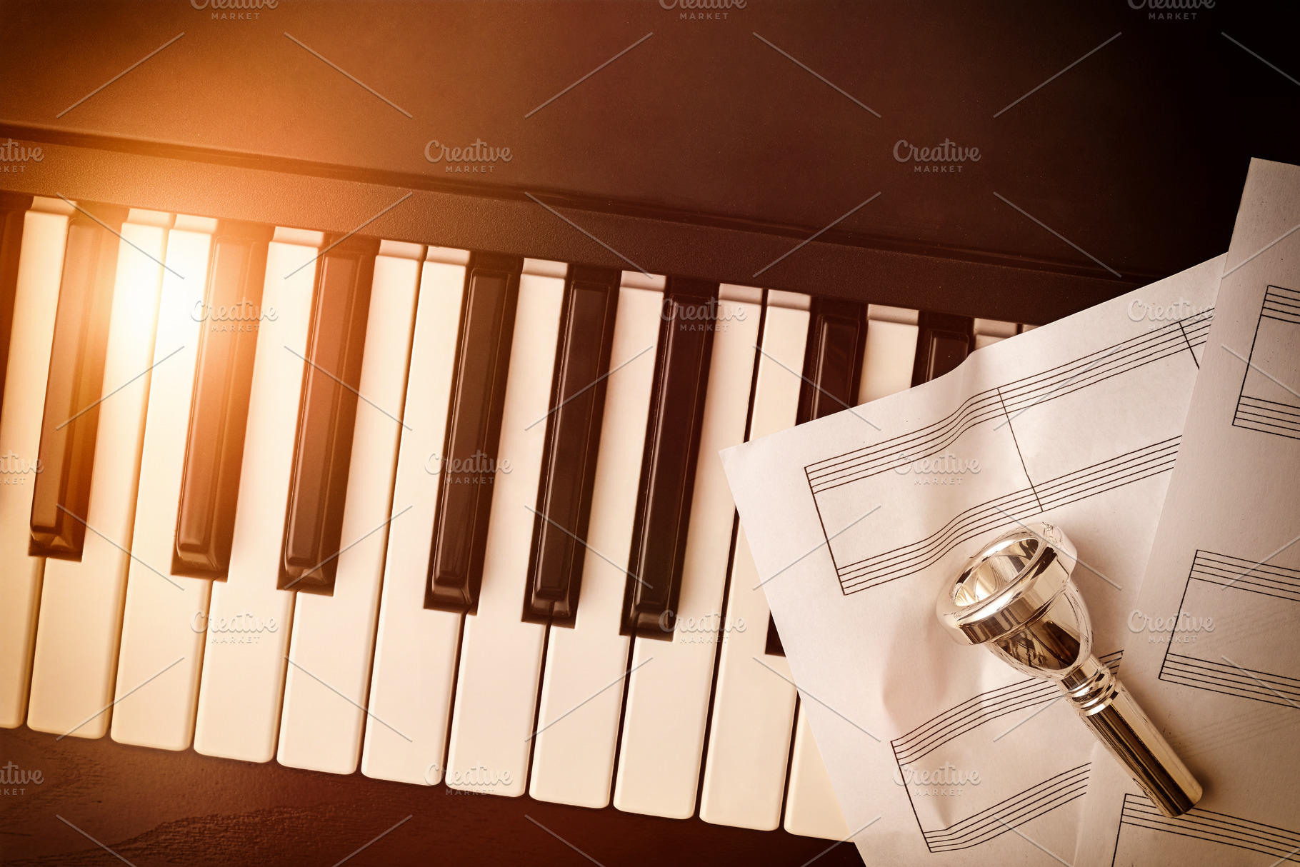 Piano and brass instruments concept with keys and mouthpiece vin, an Arts & Entertainment Photo by Davizro's Market