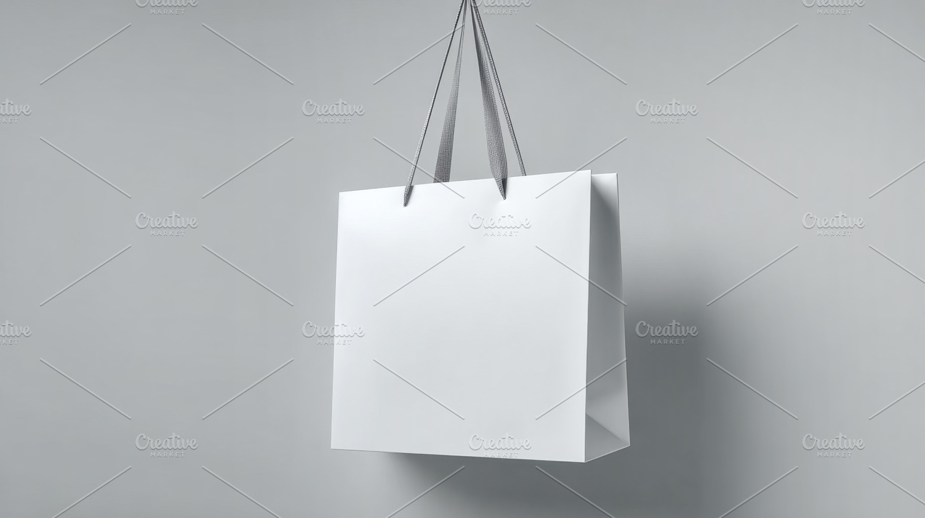 Simple white shopping bag hanging, a Photo by Beautiful things