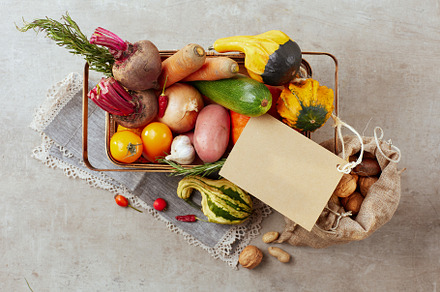 autumn flat lay on grey background with tag and pumpkins, a Food & Drink Photo by Alliance Images