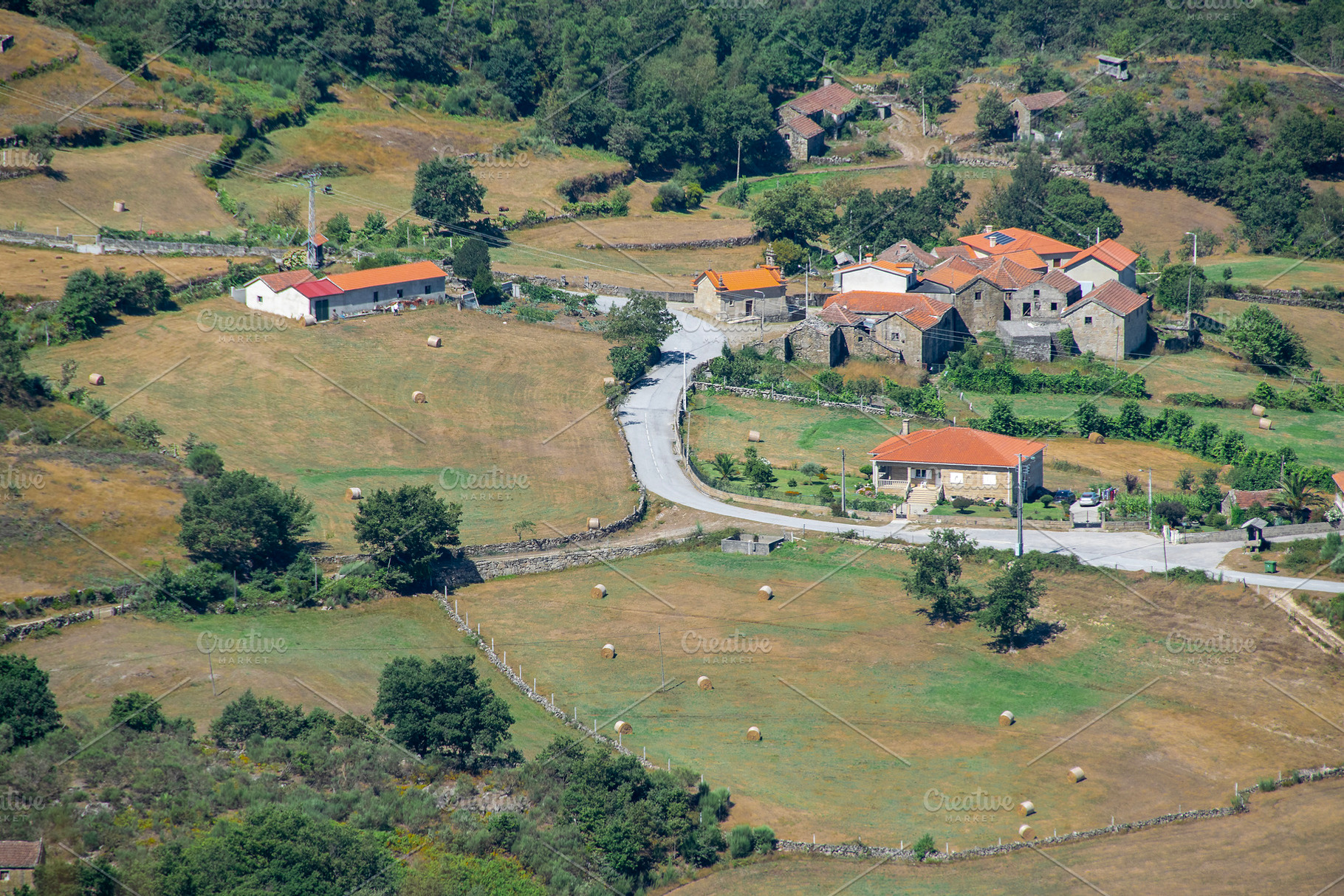 Small mountain village with terracotta rooftops, a Nature Photo by DanFLCreativo