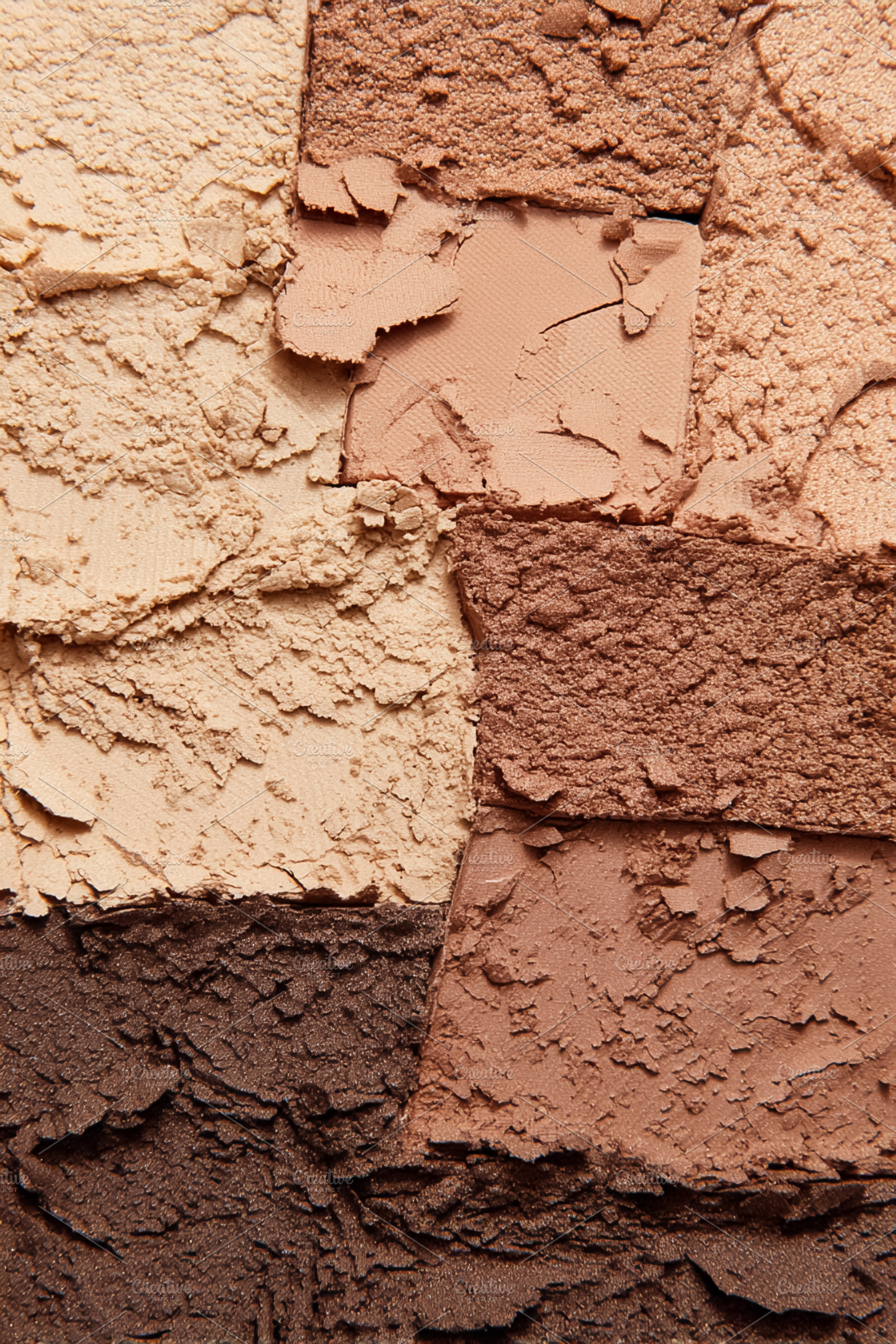Crushing various shades of powder make up for a cosmetic palette, a Photo by Studio ANNA