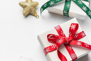 Christmas gifts decorations and fir branches creating holiday bo, a Holiday Photo by Olena Rudo