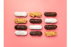 eclairs or profitroles on pink, a Food & Drink Photo by Fascinadora