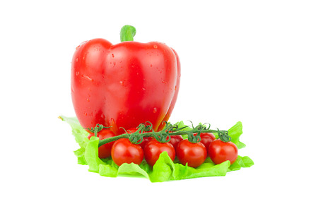 Red peppers and tomato on a white ba, a Food & Drink Photo by AlexBush