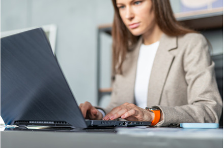 Serious focused businesswoman, a Technology Photo by undrey