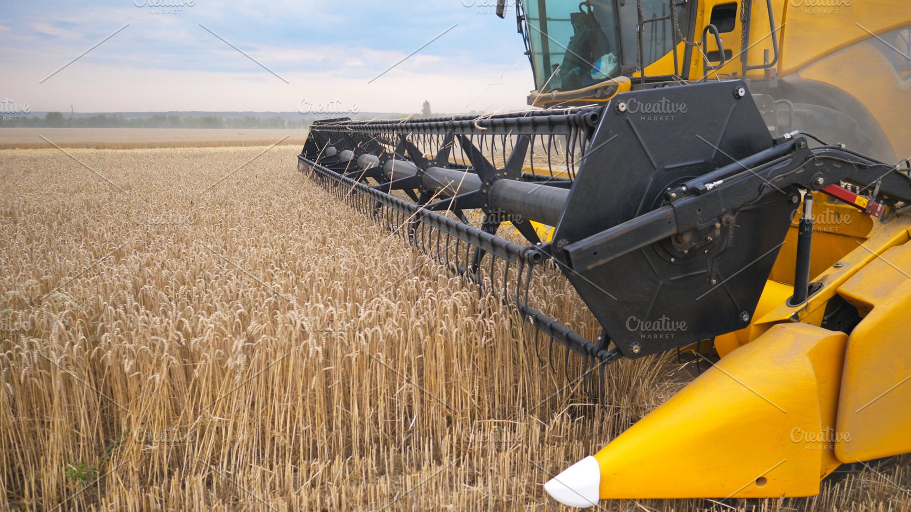 Close up knife of combine spinning featuring agriculture, background, and, an Industrial Photo by Footage Autor