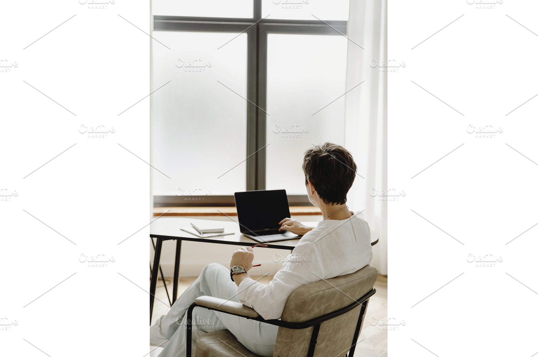 Back view of middle aged business, a Person Photo by Aliona Serzhanova