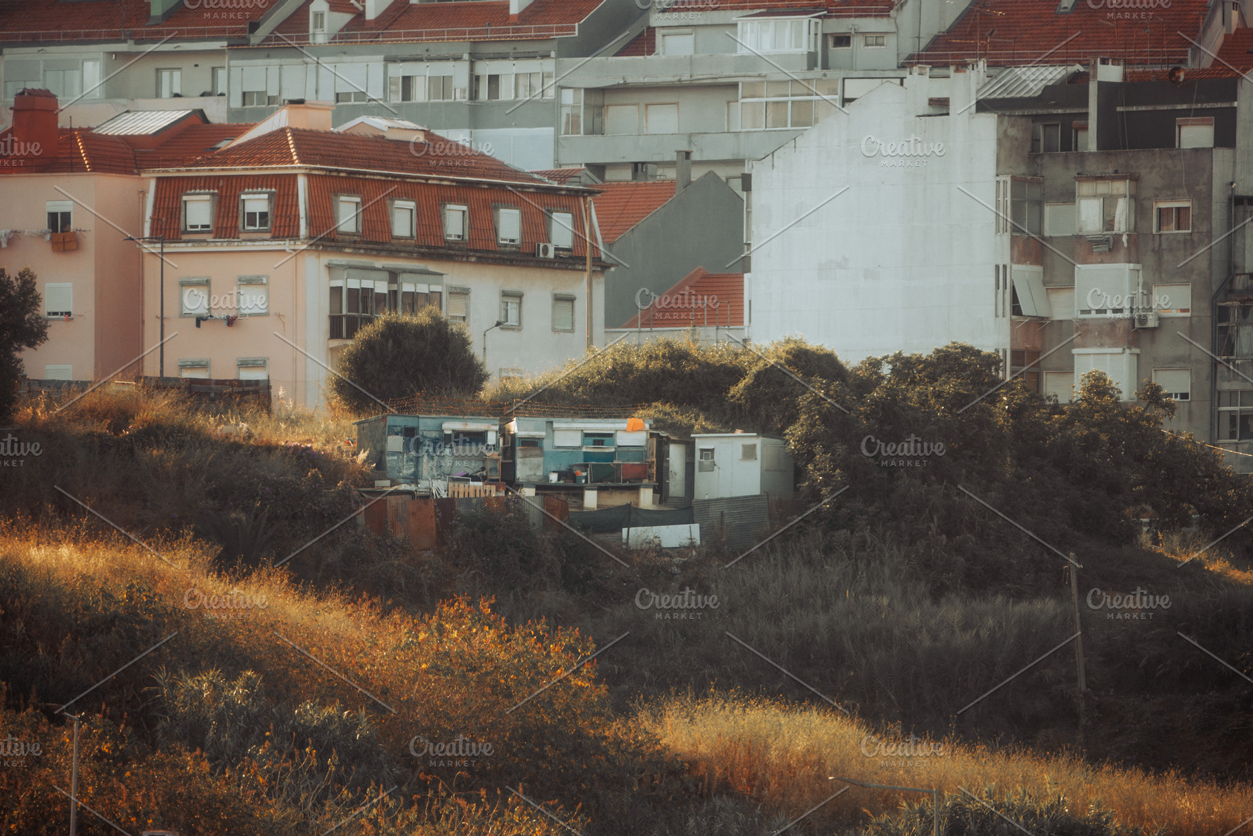 Makeshift Homes Amid City Blocks, an Architecture Photo by SkyNext