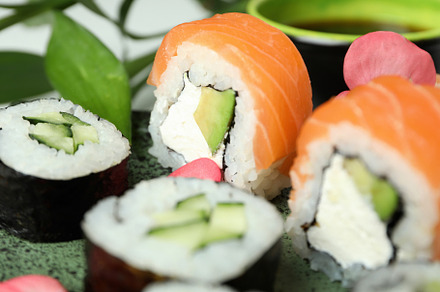 Concept of tasty food with sushi rolls, close up, a Food & Drink Photo by AtlasStudio