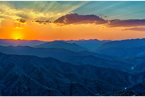 Sunset over mountains in south featuring mountain, sunset, and landscape, a Nature Photo by Leonid Andronov
