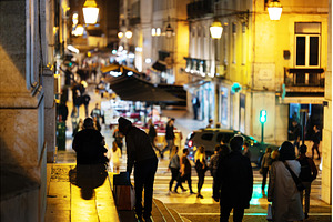 Crowd of people walking down a