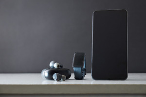 Smartphone smartwatch and headphones on white table isolated gra, a Sports & Recreation Photo by Davizro's Market
