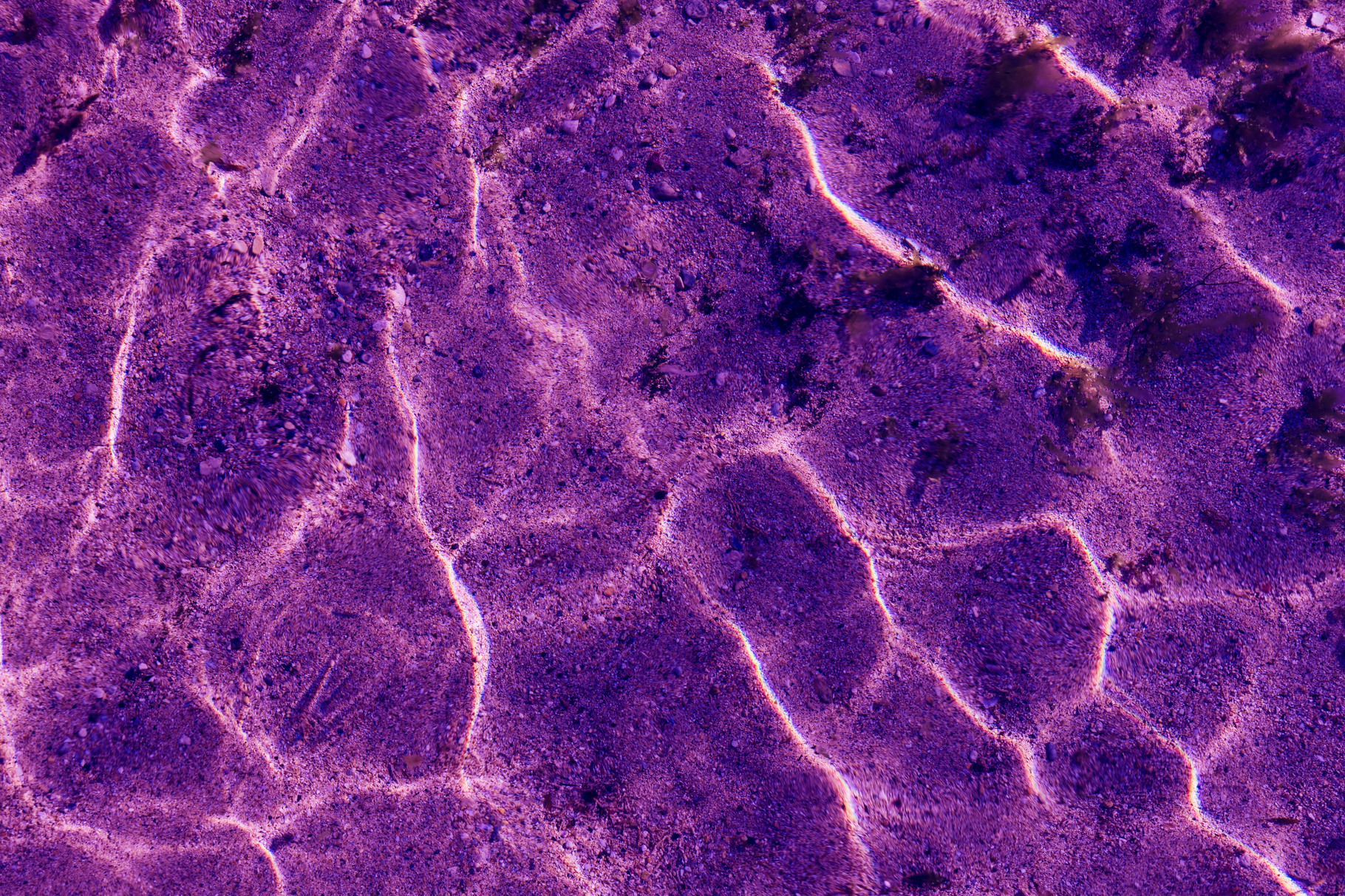Ultra violet Pattern of ripple wave, an Abstract Photo by Kira Yan