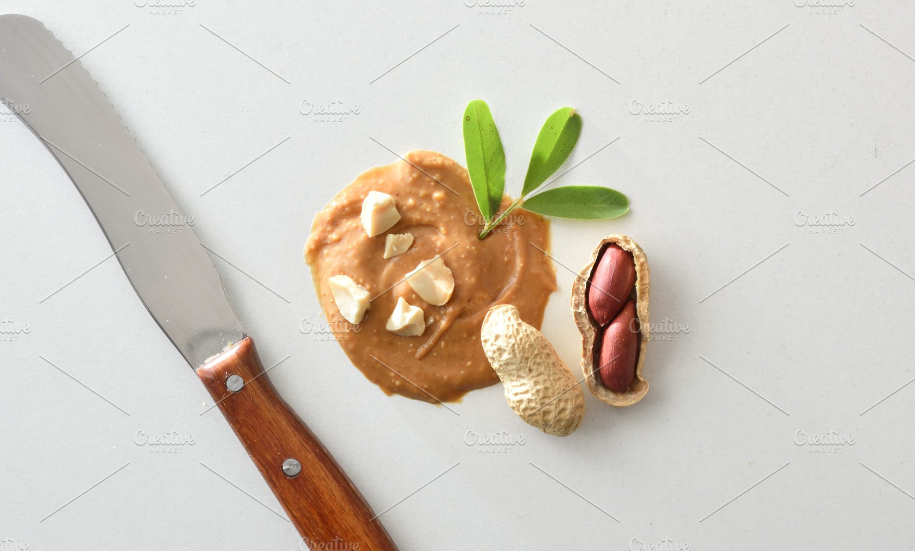 Macro background of peanut butter with knife pieces and fruits, a Food & Drink Photo by Davizro's Market