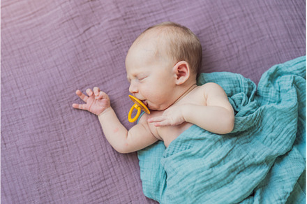 The baby is sleeping peacefully in