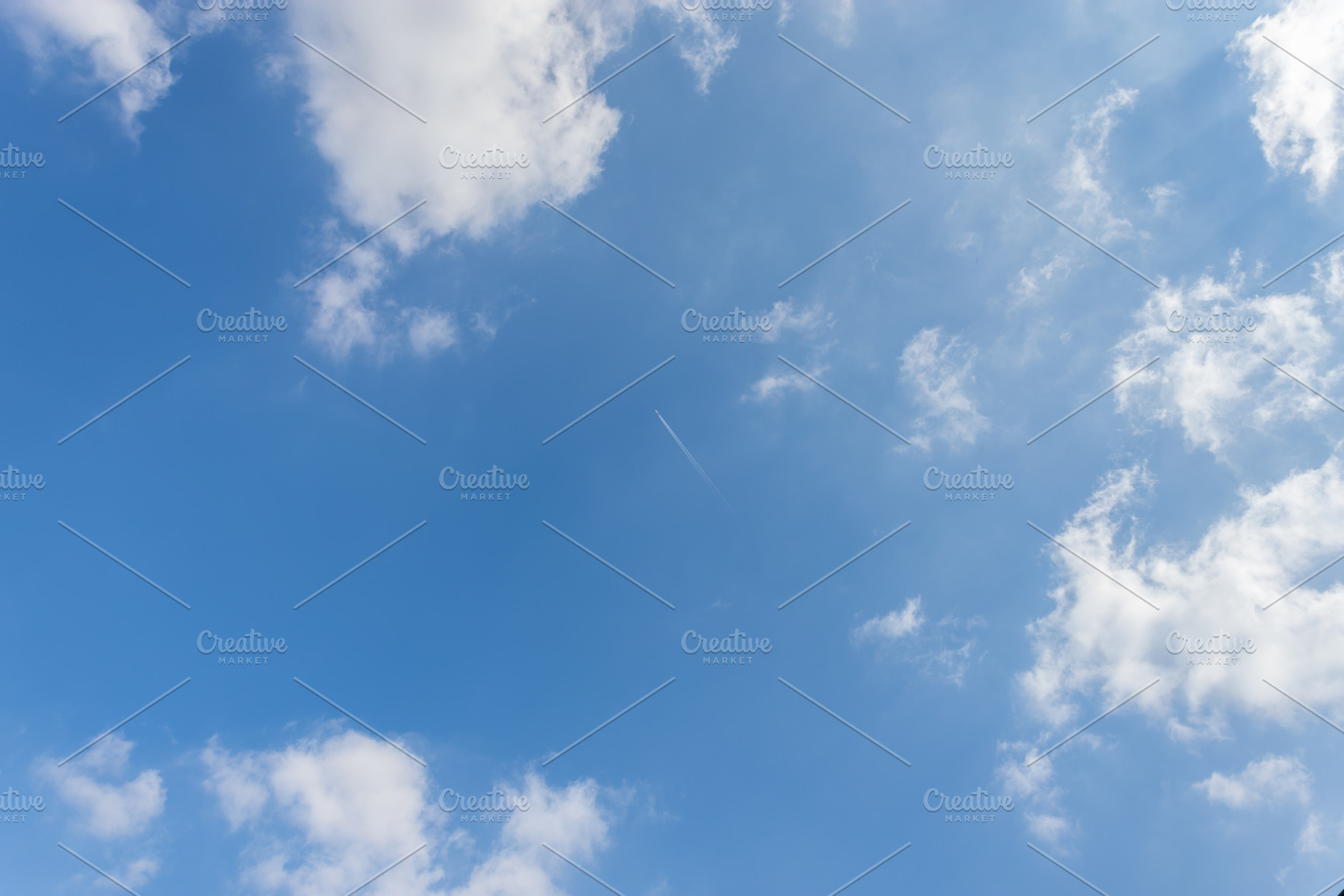 Blue sky background with white cloud, a Wallpaper Photo by KYNA STUDIO