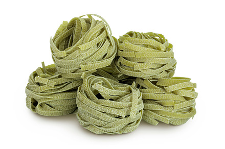 Raw tagliatelle green pasta with, a Food & Drink Photo by NataPhoto