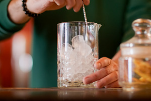 Stirring ice cocktail cube glass, a Food & Drink Photo by Photo Drive Studio