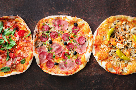 Homemade pizza. Top view with copy, a Food & Drink Photo by Enjoy Photo