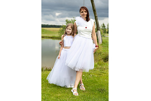 Mother and daughter in white in, a Person Photo by Nenahliadava Design