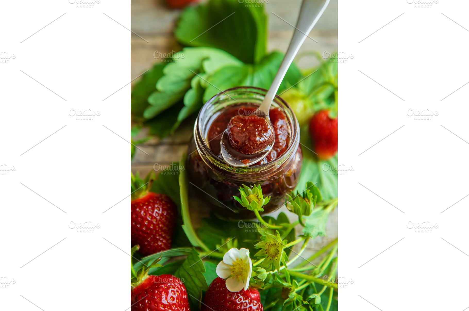 Homemade strawberry jam in a jar, a Food & Drink Photo by yanadjana