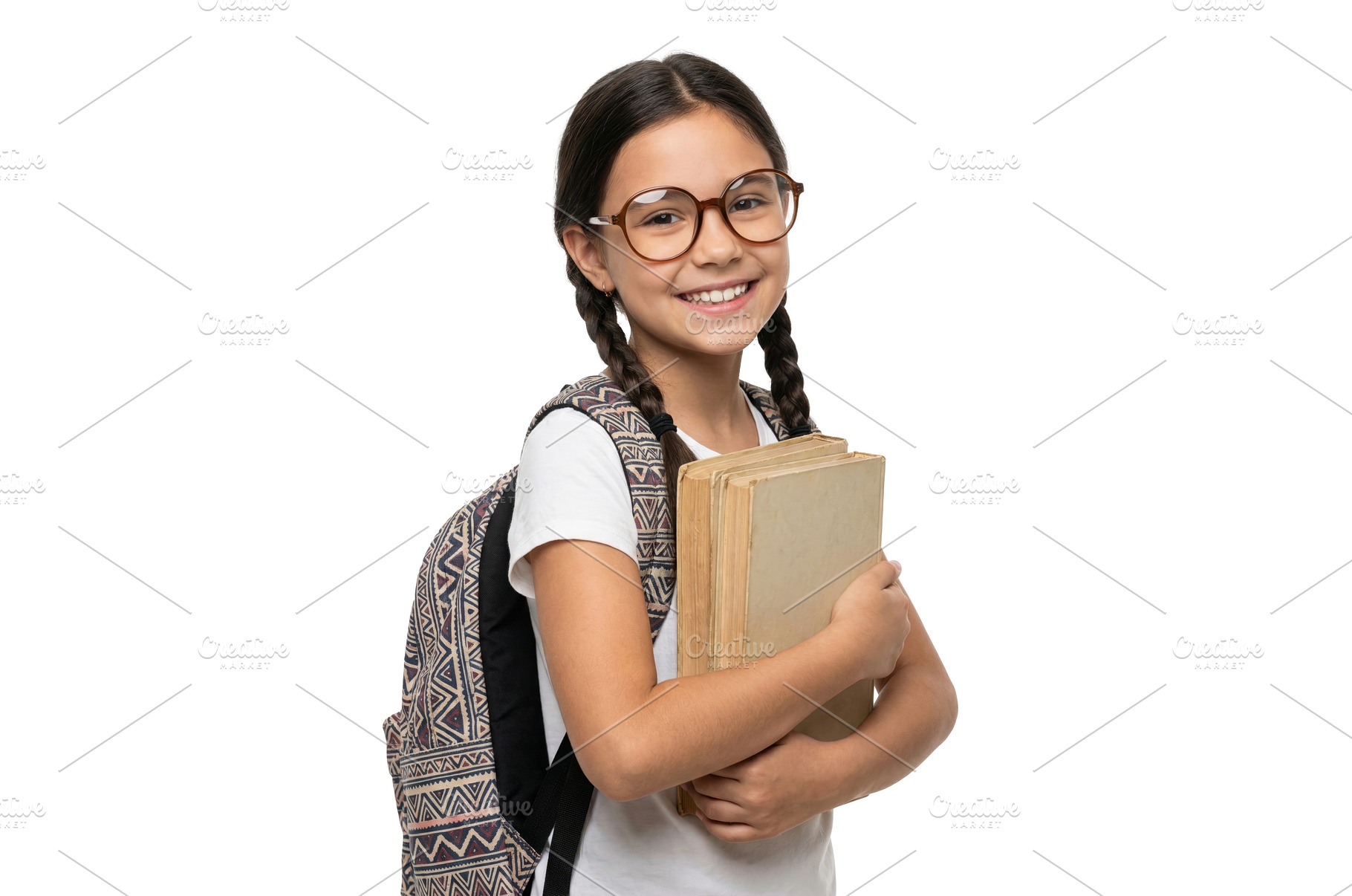 Smiling Girl With Books, a School & Education Photo by CREATIVEDEF