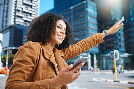Black woman, city and stop taxi with hand, phone and sunshine on urban adventure in summer. Girl, outdoor on sidewalk or street in metro for transport, bus or ride service with app, holiday or travel, a Photo by Peopleimages.com