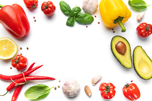 Fresh vegetables and herbs creating white copy space background, a Food & Drink Photo by Olena Rudo