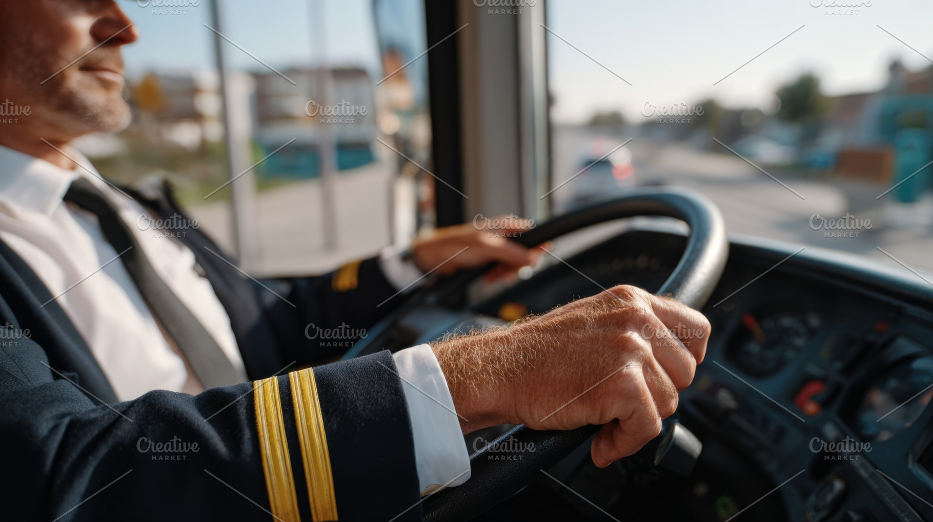 A senior male bus driver in uniform skillfully navigates city streets, showcasi, a Person Photo by ImageMir