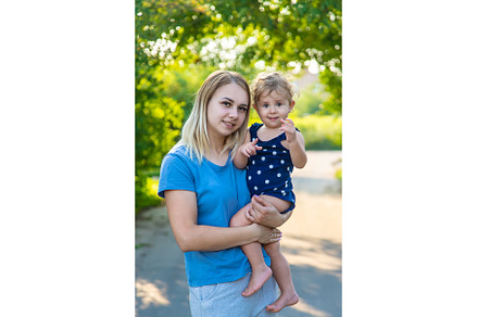 Mother in the park with a child in, a Nature Photo by yanadjana