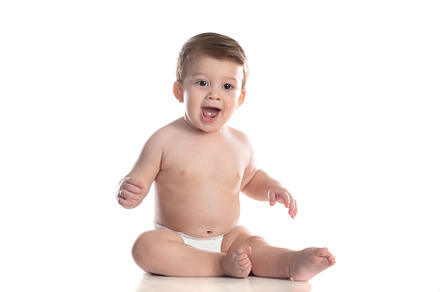 Cute baby in diaper looking at the camera, a Person Photo by José Manuel Gelpi