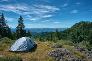 Scenic camping spot with a tent, a Photo by Pavel_design
