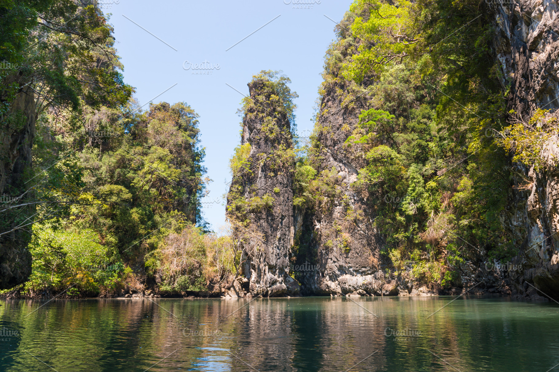 Tropical landscape of lagoon with rock islands, a Nature Photo by Vapi