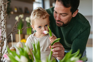 Father and little son arranging, an Arts & Entertainment Photo by HalfPoint