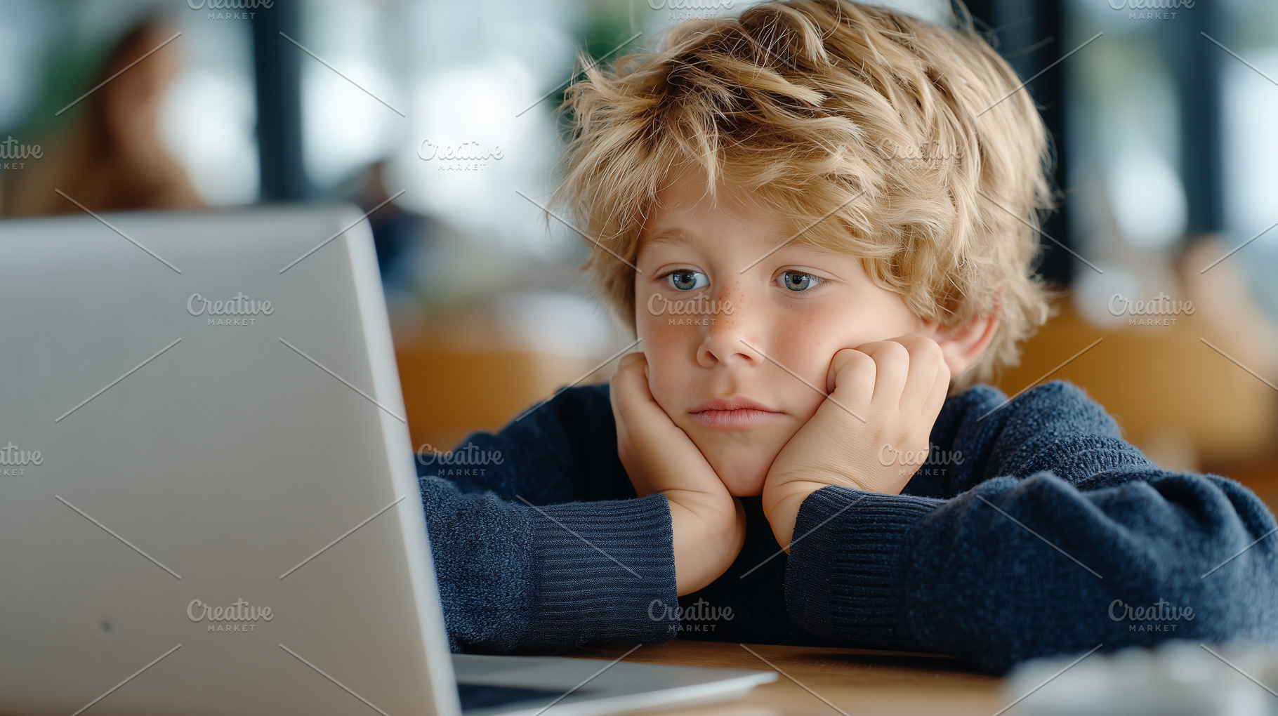 Focused or bored young boy using, a Person Photo by MistyDay