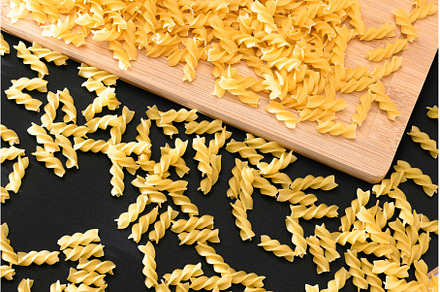 Uncooked Fusilli Pasta Scattered on, a Food & Drink Photo by InfinitumProdux